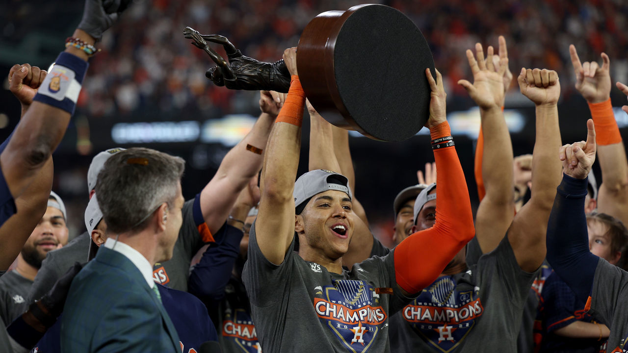 HOUSTON, TEXAS - NOVEMBER 05: Jeremy Pena #3 of the Houston Astros lifts the commissioner's trophy after defeating the Philadelphia Phillies 4-1 to win the 2022 World Series in Game Six of the 2022 World Series at Minute Maid Park on November 05, 2022 in Houston, Texas.