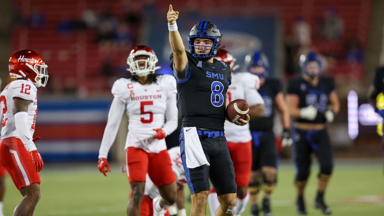 DALLAS, TX - NOVEMBER 05: Southern Methodist Mustangs quarterback Tanner Mordecai (8) signals first down during the game between SMU and Houston on November 5, 2022 at Gerald J Ford Stadium in Dallas, TX.