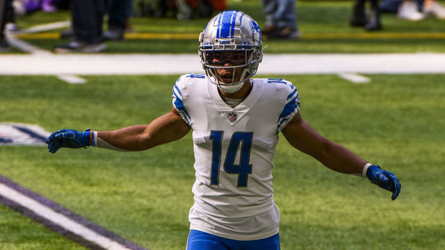 MINNEAPOLIS, MN - SEPTEMBER 25: Amon-Ra St. Brown #14 of the Detroit Lions warms up before the game against the Minnesota Vikings at U.S. Bank Stadium on September 25, 2022 in Minneapolis, Minnesota.