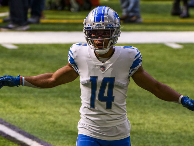 MINNEAPOLIS, MN - SEPTEMBER 25: Amon-Ra St. Brown #14 of the Detroit Lions warms up before the game against the Minnesota Vikings at U.S. Bank Stadium on September 25, 2022 in Minneapolis, Minnesota.