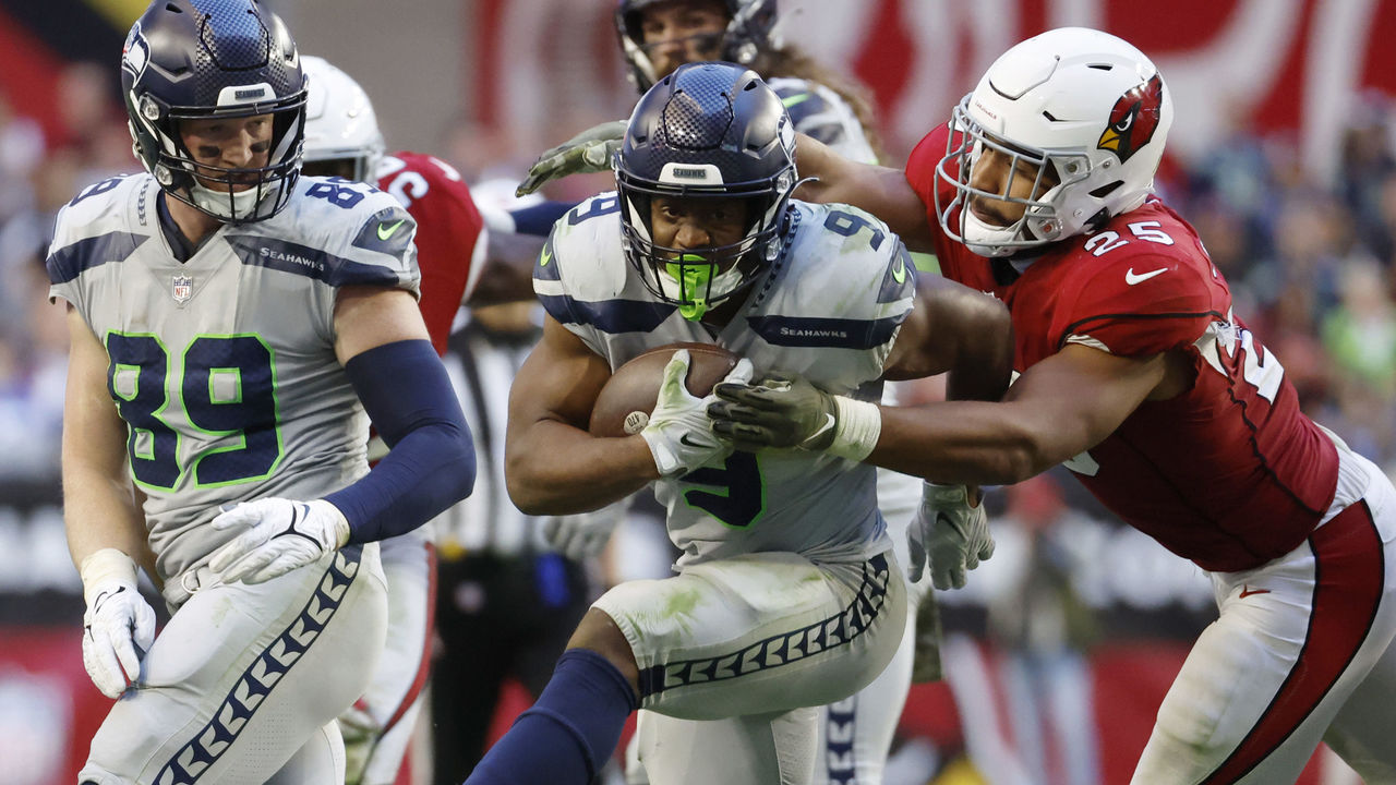 Seahawks' Darrell Taylor leaves sideline to block on interception return,  gets away with it