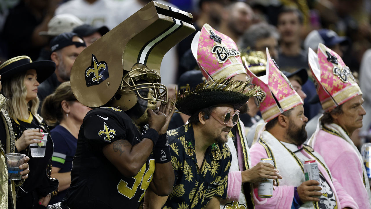 NEW ORLEANS, LOUISIANA - OCTOBER 09: Fans cheer for the New Orleans Saints at Caesars Superdome on October 09, 2022 in New Orleans, Louisiana.