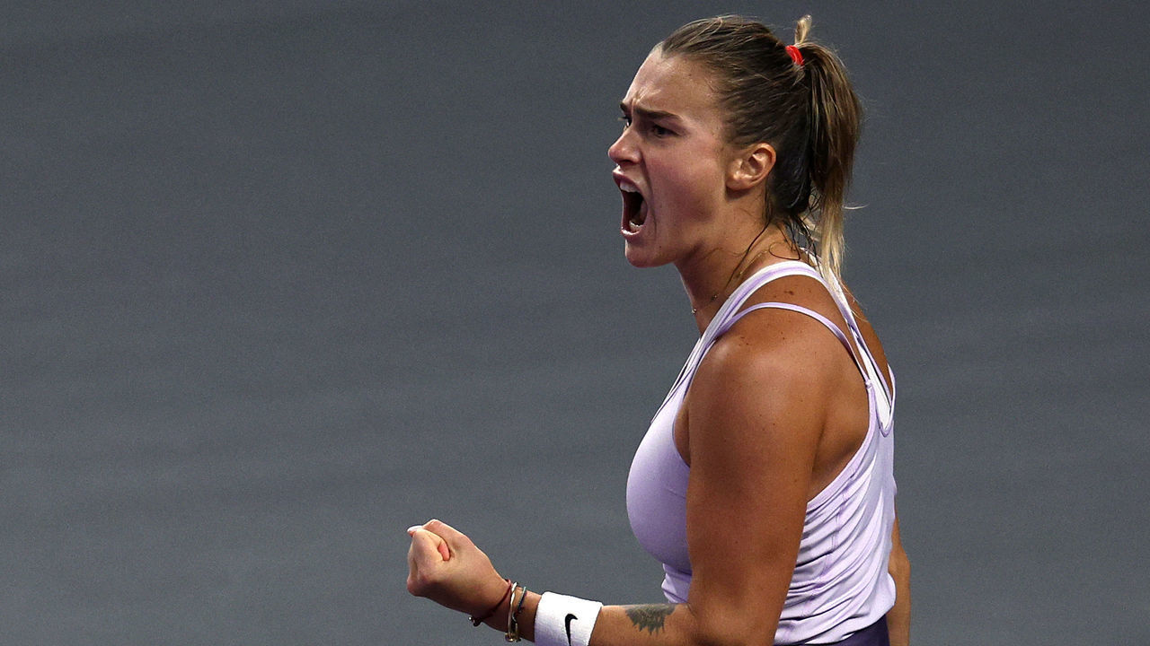 FORT WORTH, TEXAS - NOVEMBER 06: Aryna Sabalenka of Belarus celebrates a point against Iga Swiatek of Poland in their Women's Singles Semifinal match during the 2022 WTA Finals, part of the Hologic WTA Tour, at Dickies Arena on November 06, 2022 in Fort Worth, Texas.