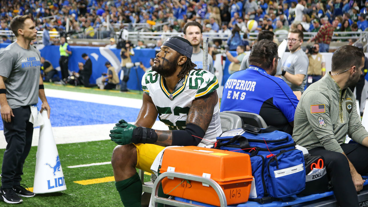 DETROIT, MI - NOVEMBER 06: Green Bay Packers linebacker Rashan Gary (52) looks on as he rides on a medical cart that takes him off of the field during the second quarter of an NFL regular season football game between the Green Bay Packers and the Detroit Lions on November 6, 2022 at Ford Field in Detroit, Michigan.