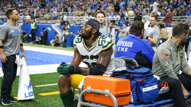 DETROIT, MI - NOVEMBER 06: Green Bay Packers linebacker Rashan Gary (52) looks on as he rides on a medical cart that takes him off of the field during the second quarter of an NFL regular season football game between the Green Bay Packers and the Detroit Lions on November 6, 2022 at Ford Field in Detroit, Michigan.