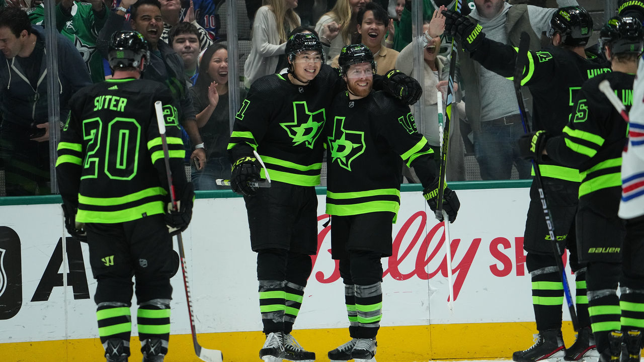 DALLAS, TX - OCTOBER 29: Jason Robertson #21, Joe Pavelski #16, Ryan Suter #20 and the Dallas Stars celebrate a goal against the New York Rangers at the American Airlines Center on October 29, 2022 in Dallas, Texas.