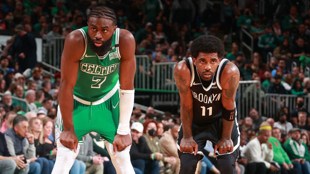 BOSTON, MA - MARCH 6: Jaylen Brown #7 of the Boston Celtics and Kyrie Irving #11 of the Brooklyn Nets looks on on March 6, 2022 at the TD Garden in Boston, Massachusetts. Mandatory Copyright Notice: Copyright 2022 NBAE
