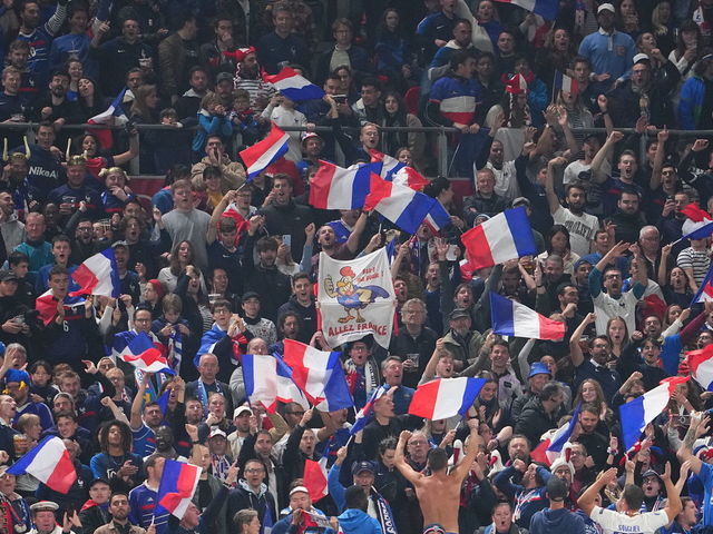 COPENHAGEN, DENMARK - SEPTEMBER 25: French fans cheer during the UEFA Nations League match between Denmark and France at Parken on September 25, 2022 in Copenhagen, Denmark.