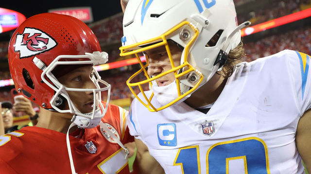 KANSAS CITY, MISSOURI - SEPTEMBER 15: Patrick Mahomes #15 of the Kansas City Chiefs shakes hands with Justin Herbert #10 of the Los Angeles Chargers at Arrowhead Stadium on September 15, 2022 in Kansas City, Missouri. Kansas City defeated Los Angeles 27-24.