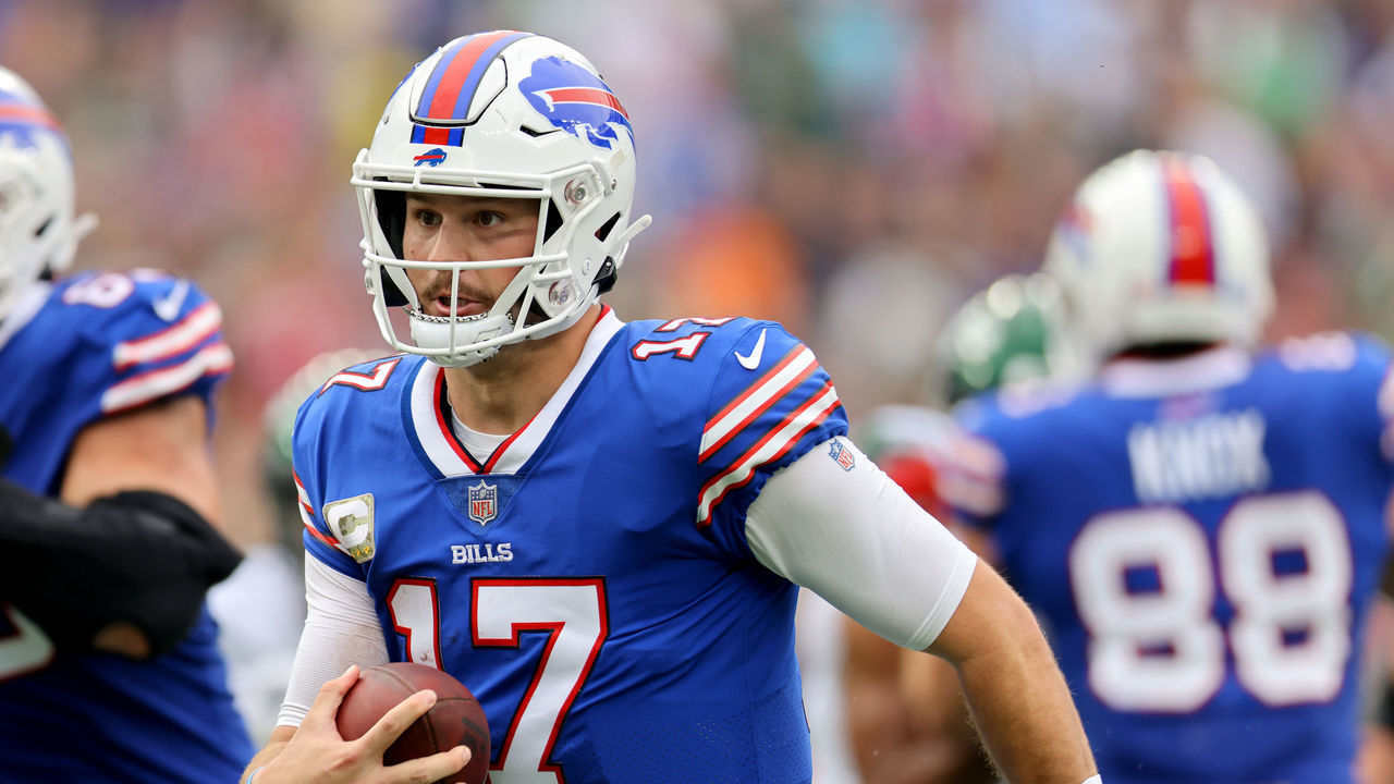 EAST RUTHERFORD, NEW JERSEY - NOVEMBER 06: Josh Allen #17 of the Buffalo Bills rushes for a touchdown against the New York Jets during the second quarter at MetLife Stadium on November 06, 2022 in East Rutherford, New Jersey.