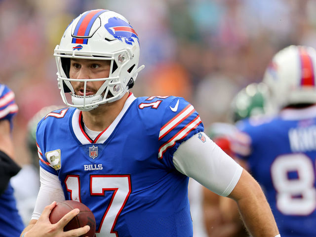 EAST RUTHERFORD, NEW JERSEY - NOVEMBER 06: Josh Allen #17 of the Buffalo Bills rushes for a touchdown against the New York Jets during the second quarter at MetLife Stadium on November 06, 2022 in East Rutherford, New Jersey.