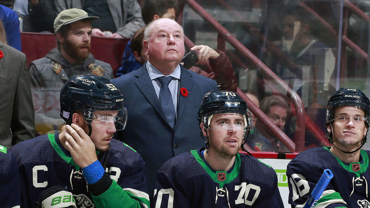 VANCOUVER, CANADA - NOVEMBER 1: Head coach Bruce Boudreau of the Vancouver Canucks looks on from the bench during their NHL game against the New Jersey Devils at Rogers Arena November 1, 2022 in Vancouver, British Columbia, Canada.