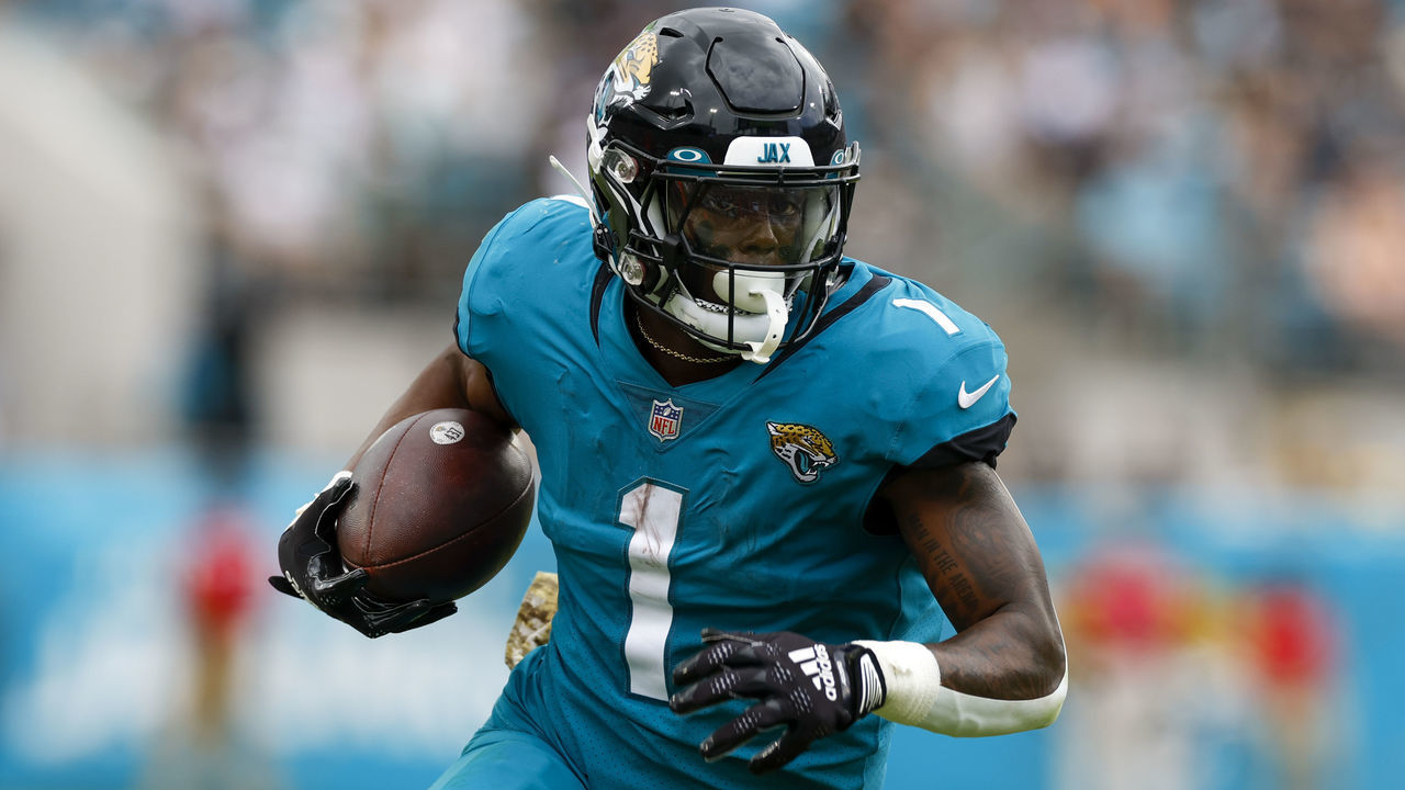 JACKSONVILLE, FL - NOVEMBER 06: Jacksonville Jaguars running back Travis Etienne Jr. (1) runs with the ball during the game between the Las Vegas Raiders and the Jacksonville Jaguars on November 6, 2022 at TIAA Bank Field in Jacksonville, Fl.