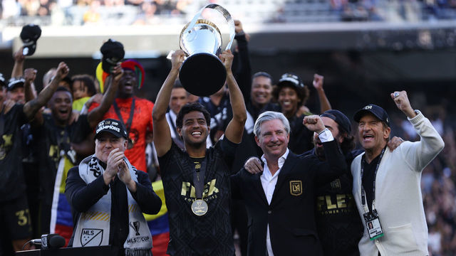 LOS ANGELES, CA - NOVEMBER 05: Carlos Vela #10 of LAFC lifts the trophy to celebrate after winning the MLS Cup Final match between Philadelphia Union and LAFC as part of the MLS Cup Final 2022 at Banc of California Stadium on November 5, 2022 in Los Angeles, California.