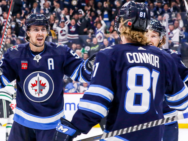 Winnipeg Jets center Mark Scheifele celebrates after scoring