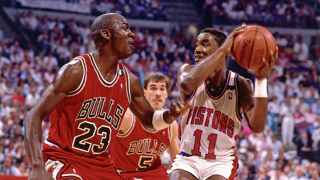 AUBURN HILLS, MI - 1988: Isiah Thomas #11 of the Detroit Pistons stops his drives against Michael Jordan #23 of the Chicago Bulls during an NBA game in 1988 at The Palace in Auburn Hills, Michigan. NOTE TO USER: User expressly acknowledges and agrees that, by downloading and/or using this Photograph, user is consenting to the terms and conditions of the Getty Images License Agreement. Mandatory Copyright Notice: Copyright 1988 NBAE