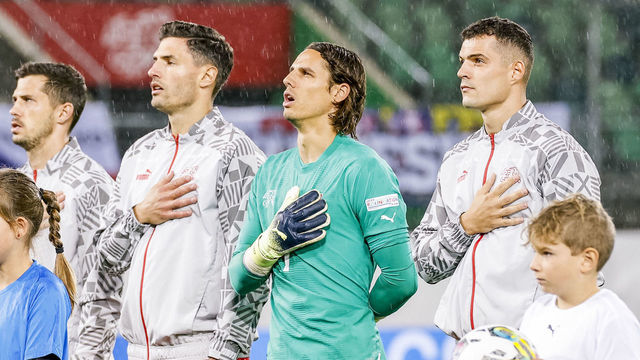 ST GALLEN, SWITZERLAND - SEPTEMBER 27: Granit Xhaka of Switzerland (R), goalkeeper Yann Sommer of Switzerland, Fabian Schar of Switzerland, Remo Freuler of Switzerland, Silvan Widmer of Switzerland and Nico Elvedi of Switzerland (L) during the national anthem before the UEFA Nations League League A Group 2 match between Switzerland and Czech Republic at Kybunpark on September 27, 2022 in St Gallen, Switzerland.