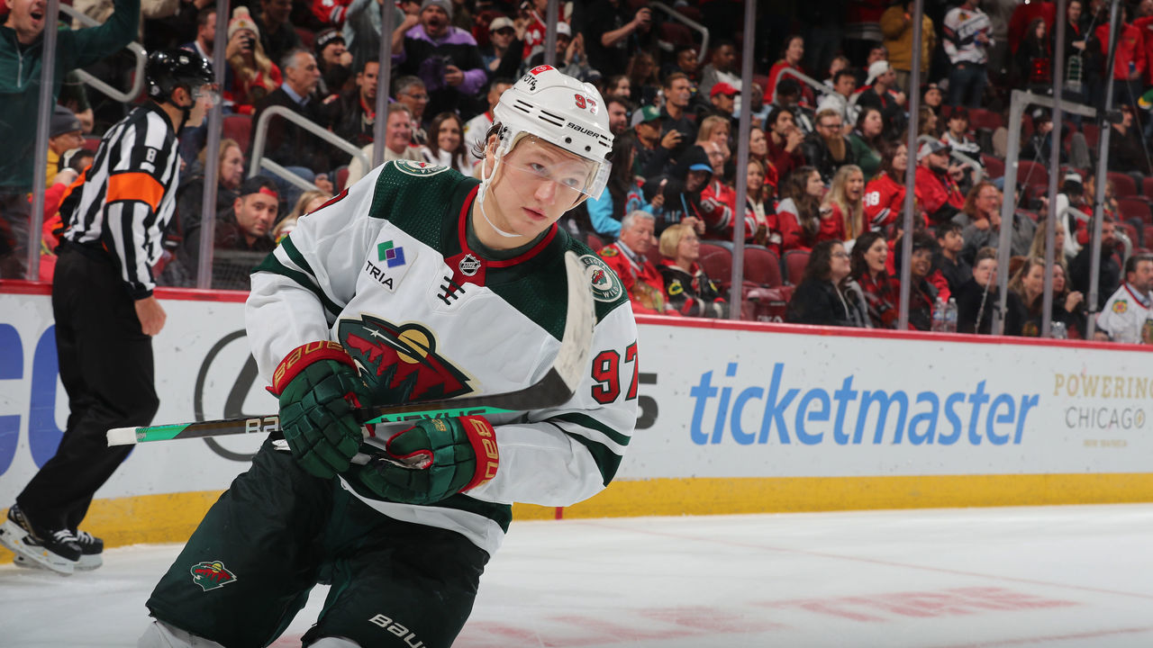 CHICAGO, ILLINOIS - OCTOBER 30: Kirill Kaprizov #97 of the Minnesota Wild scores against the Chicago Blackhawks in the shoot-out at United Center on October 30, 2022 in Chicago, Illinois.