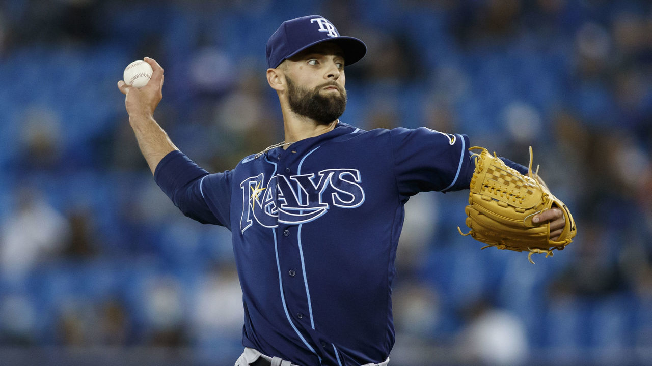 TORONTO, ONTARIO - SEPTEMBER 13: Nick Anderson #70 of the Tampa Bay Rays pitches in the seventh inning of their MLB game against the Tampa Bay Rays at Rogers Centre on September 13, 2021 in Toronto, Ontario.