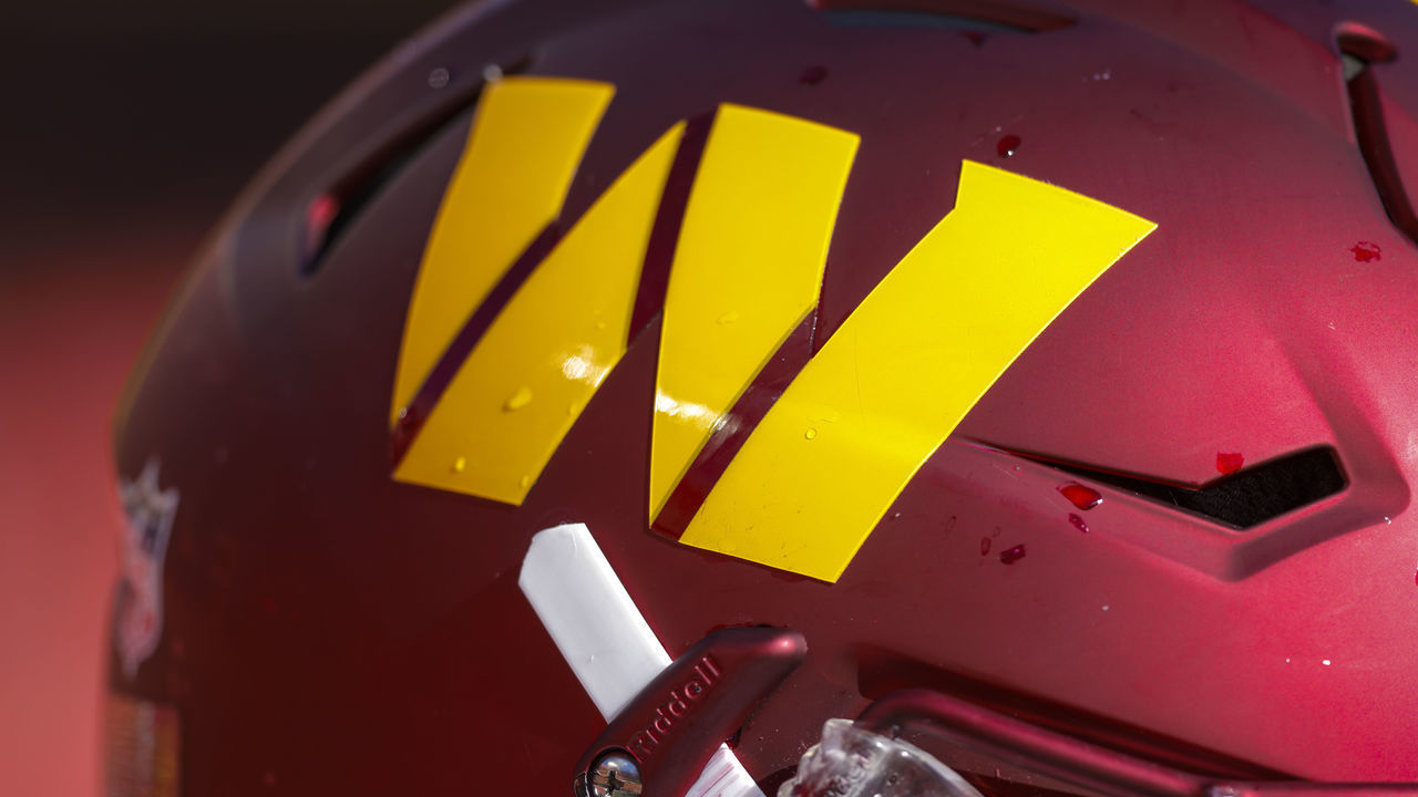 KANSAS CITY, MO - AUGUST 20: The gold Washington Commanders helmet logo on the burgundy helmet, worn by Willie Beavers #64 of the Washington Commanders during the preseason game against the Kansas City Chiefs at Arrowhead Stadium on August 20, 2022 in Kansas City, Missouri.