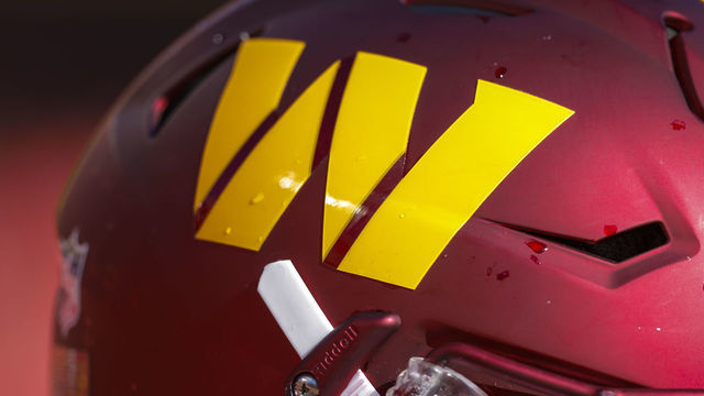 KANSAS CITY, MO - AUGUST 20: The gold Washington Commanders helmet logo on the burgundy helmet, worn by Willie Beavers #64 of the Washington Commanders during the preseason game against the Kansas City Chiefs at Arrowhead Stadium on August 20, 2022 in Kansas City, Missouri.