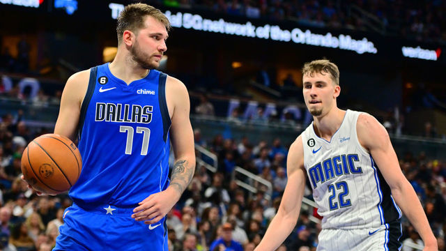 ORLANDO, FLORIDA - NOVEMBER 09: Luka Doncic #77 of the Dallas Mavericks dribbles the ball against Franz Wagner #22 of the Orlando Magic in the second half of a game at Amway Center on November 09, 2022 in Orlando, Florida.