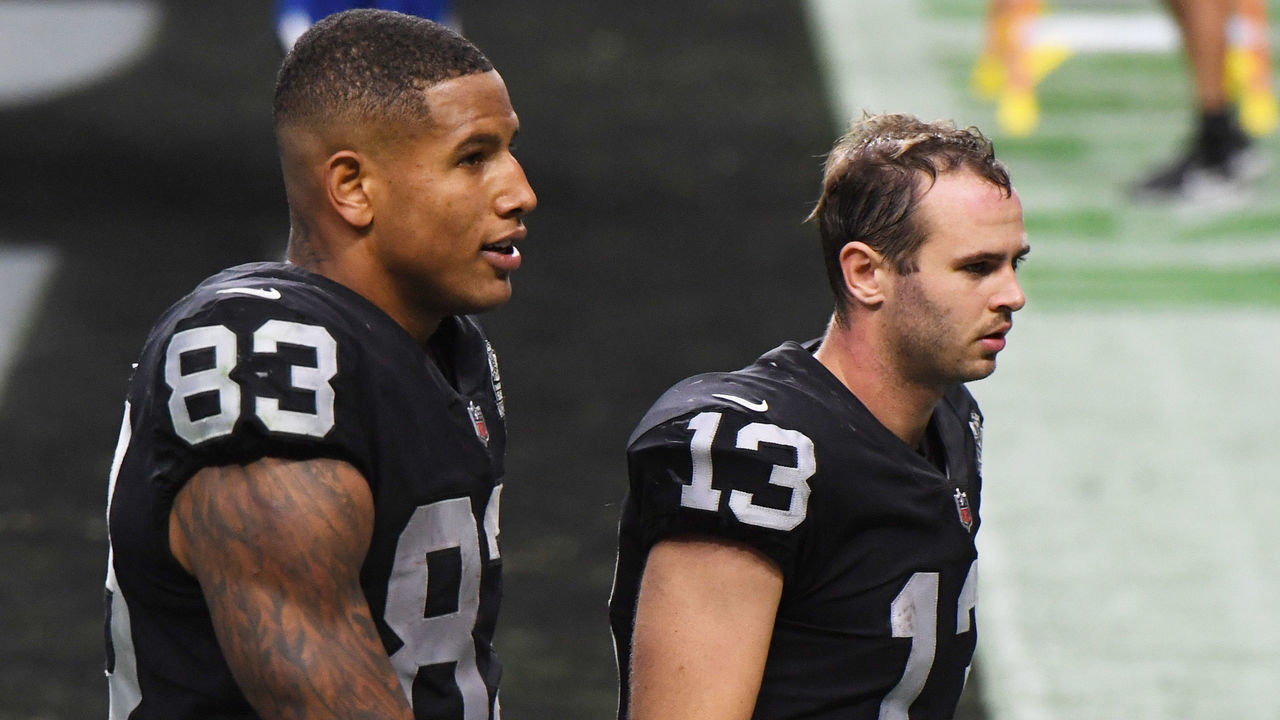 LAS VEGAS, NEVADA - OCTOBER 04: Darren Waller #83 and Hunter Renfrow #13 of the Las Vegas Raiders walk off the field after the team's 30-23 loss to the Buffalo Bills in the NFL game at Allegiant Stadium on October 4, 2020 in Las Vegas, Nevada.