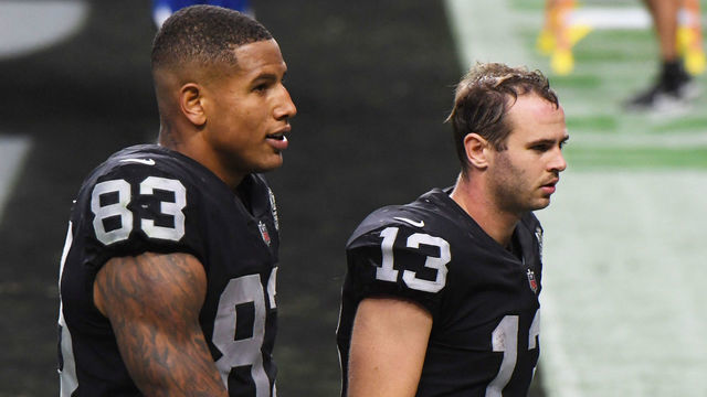 LAS VEGAS, NEVADA - OCTOBER 04: Darren Waller #83 and Hunter Renfrow #13 of the Las Vegas Raiders walk off the field after the team's 30-23 loss to the Buffalo Bills in the NFL game at Allegiant Stadium on October 4, 2020 in Las Vegas, Nevada.