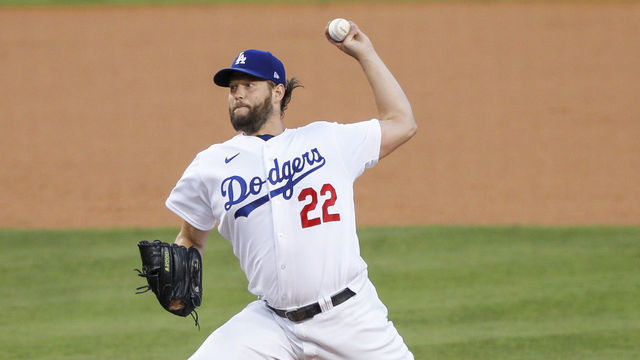 LOS ANGELES, CA - OCTOBER 12: Los Angeles Dodgers starting pitcher Clayton Kershaw (22) throws to the plate during the NLDS Game 2 between the San Diego Padres and the Los Angeles Dodgers on October 12, 2022 at Dodger Stadium in Los Angeles, CA.