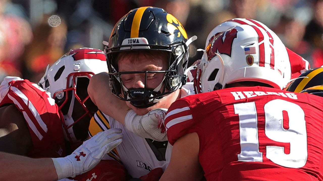 MADISON, WISCONSIN - OCTOBER 30: Spencer Petras #7 of the Iowa Hawkeyes scores a touchdown during the second half against the Wisconsin Badgers at Camp Randall Stadium on October 30, 2021 in Madison, Wisconsin. The Badgers defeated the Hawkeyes 27-7.