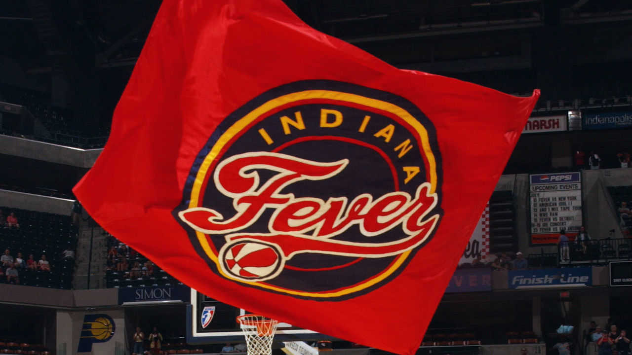 INDIANAPOLIS - JULY 6: Freddy waves an Indiana Fever flag during the WNBA game against the Detroit Shock at Conseco Fieldhouse on July 6, 2003 in Indianapolis, Indiana. The Fever won 85-54.