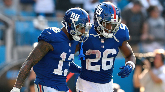 CHARLOTTE, NC - OCTOBER 07: Odell Beckham Jr. #13 and Saquon Barkley #26 of the New York Giants during their game against the Carolina Panthers at Bank of America Stadium on October 7, 2018 in Charlotte, North Carolina. The Panthers won 33-31.