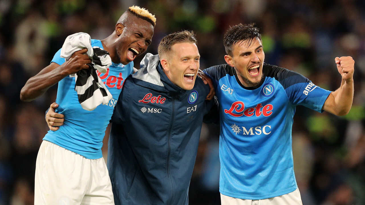 NAPLES, ITALY - NOVEMBER 12: Victor Osimhen, Piotr Zielinski and Eljif Elmas of SSC Napoli celebrate the victory after the Serie A match between SSC Napoli and Udinese Calcio at Stadio Diego Armando Maradona on November 12, 2022 in Naples, Italy.
