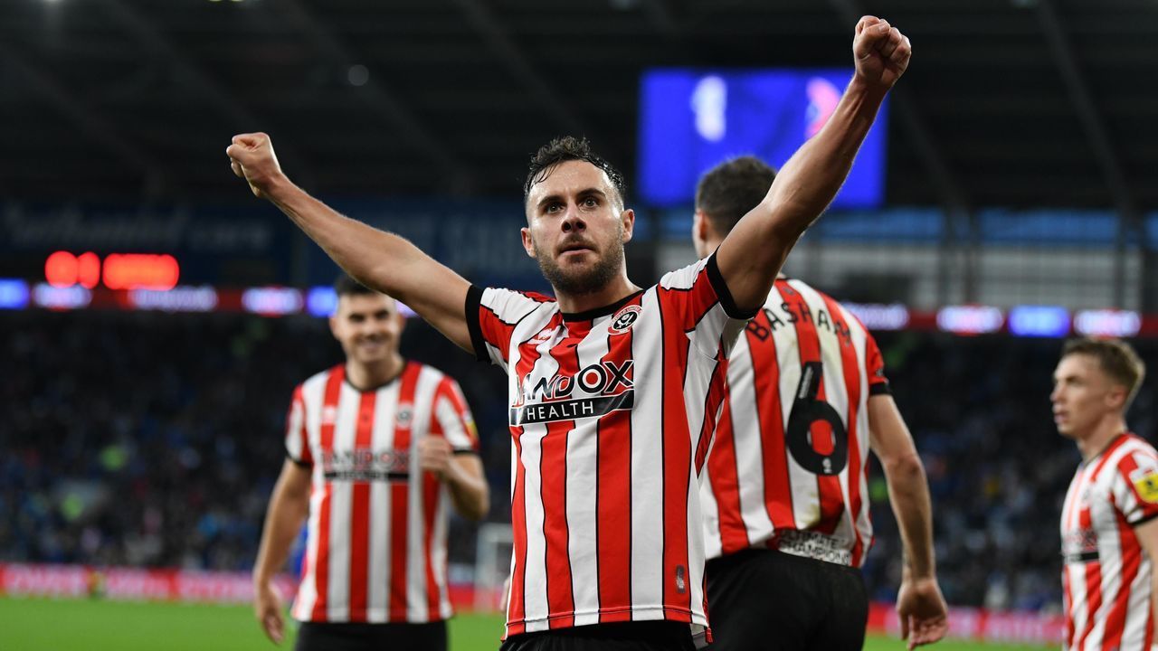 Sheffield United's George Baldock celebrates scoring the opening goal during the Sky Bet Championship match at Cardiff City Stadium, Cardiff. Picture date: Saturday November 12, 2022.