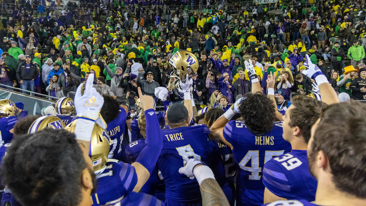 EUGENE, OR - NOVEMBER 12: The Washington Huskies celebrate their victory against the Oregon Ducks at Autzen Stadium on November 12, 2022 in Eugene, Oregon.