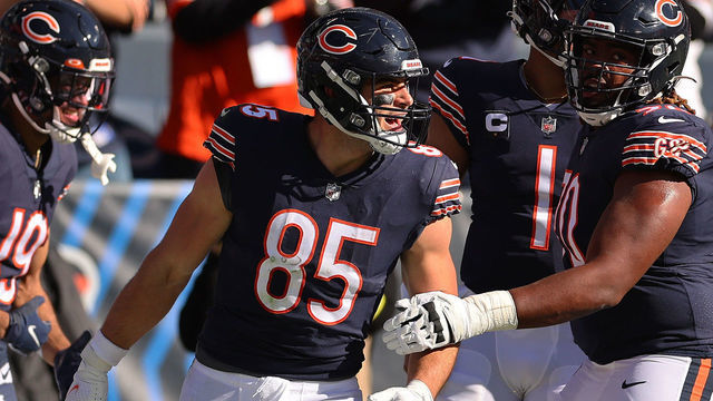 CHICAGO, ILLINOIS - NOVEMBER 06: Cole Kmet #85 of the Chicago Bears celebrates a touchdown against the Miami Dolphins at Soldier Field on November 06, 2022 in Chicago, Illinois.