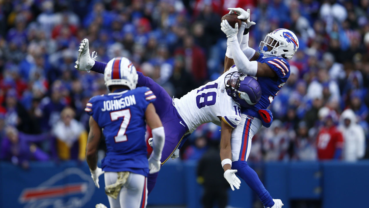 ORCHARD PARK, NEW YORK - NOVEMBER 13: Justin Jefferson #18 of the Minnesota Vikings catches a pass in front of Cam Lewis #39 of the Buffalo Bills during the fourth quarter at Highmark Stadium on November 13, 2022 in Orchard Park, New York.