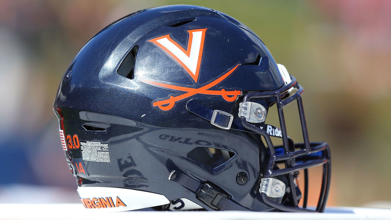 CHARLOTTESVILLE, VA - OCTOBER 08: Virginia Cavaliers helmet resting on the sidelines during a college football game between the Louisville Cardinals and the Virginia Cavaliers on October 08, 2022, at Scott Stadium in Charlottesville, VA.