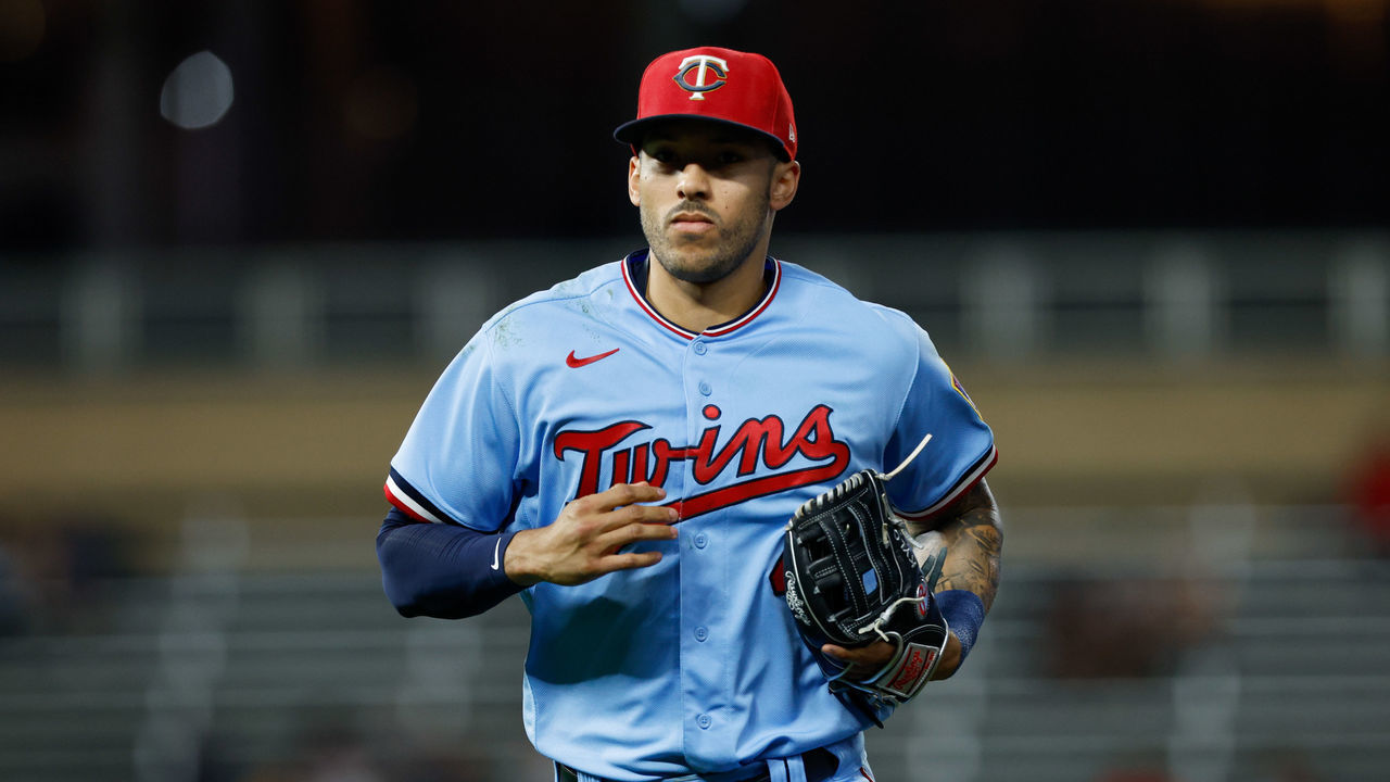 MINNEAPOLIS, MN - SEPTEMBER 14: Carlos Correa #4 of the Minnesota Twins returns to the dugout in the eighth inning during the game between the Kansas City Royals and the Minnesota Twins at Target Field on Wednesday, September 14, 2022 in Minneapolis, Minnesota.