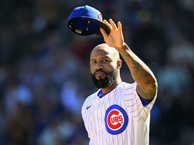 CHICAGO, ILLINOIS - OCTOBER 01: Jason Heyward #22 of the Chicago Cubs reacts after being honored in the fourth inning against the Cincinnati Reds at Wrigley Field on October 01, 2022 in Chicago, Illinois.