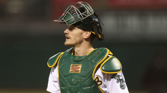 OAKLAND, CALIFORNIA - SEPTEMBER 21: Catcher Sean Murphy #12 of the Oakland Athletics looks on during the game against the Seattle Mariners at RingCentral Coliseum on September 21, 2022 in Oakland, California.