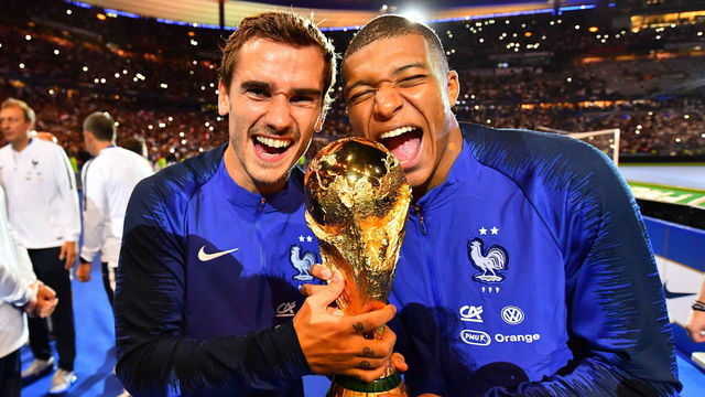 Kylian Mbappe, Atoine Griezmann of France celebrate with the World Cup Trophy after the UEFA Nations League A group official match between France and Netherlands at Stade de France on September 9, 2018 in Paris, France. This is the first match of the French football team at the Stade de France since their victory in the final of the World Cup in Russia.