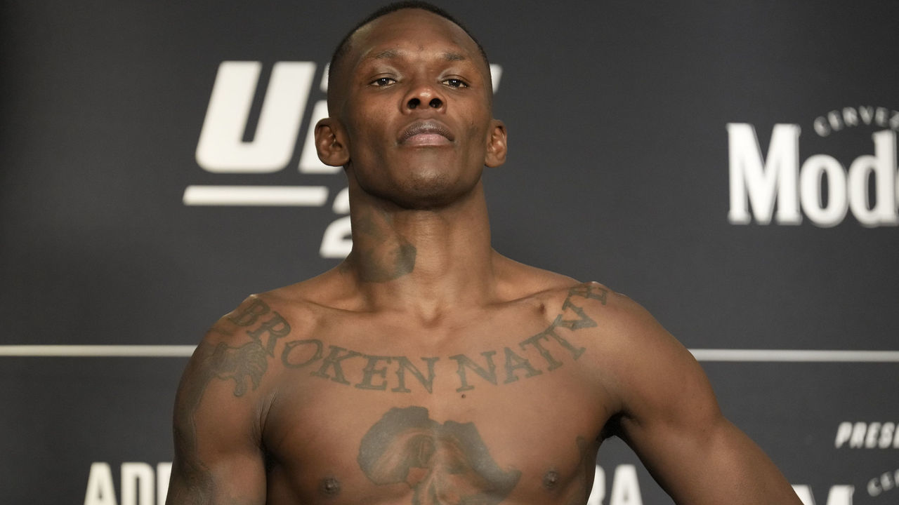 NEW YORK CITY, NY - NOVEMBER 11: Israel Adesanya steps on the scale for the official weigh-in during the Official Weigh-ins for UFC 281 on November 11, 2022, at the Marriott Marquis Times Square in New York City, NY.