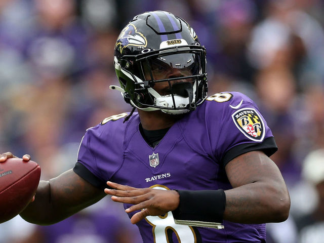 Baltimore Ravens quarterback Lamar Jackson (8) drops back during