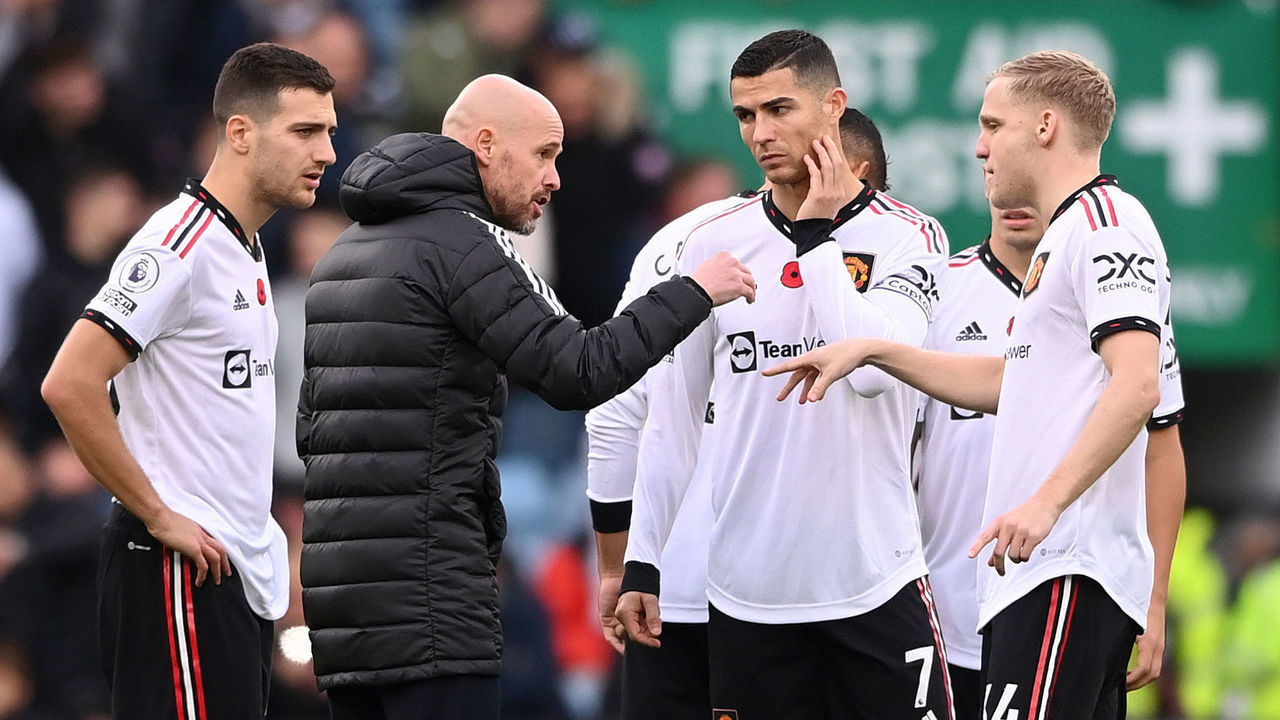 BIRMINGHAM, ENGLAND - NOVEMBER 06: Cristiano Ronaldo of Manchester United listens as manager Erik ten Hag gives instructions in the centre circle of the pitch prior to the second half starting during the Premier League match between Aston Villa and Manchester United at Villa Park on November 06, 2022 in Birmingham, England.