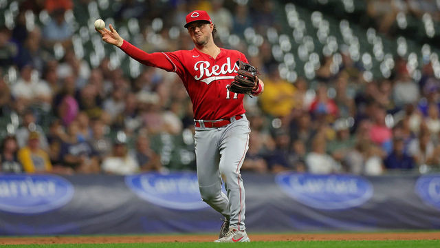 MILWAUKEE, WISCONSIN - SEPTEMBER 09: Kyle Farmer #17 of the Cincinnati Reds makes a throw to first base during the first inning against the Milwaukee Brewers at American Family Field on September 09, 2022 in Milwaukee, Wisconsin.