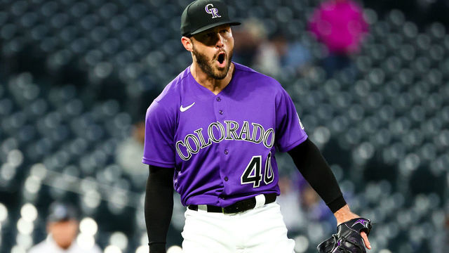 DENVER, CO - JUNE 01: Tyler Kinley #40 of the Colorado Rockies celebrates during the eighth inning against the Miami Marlins at Coors Field on June 1, 2022 in Denver, Colorado.