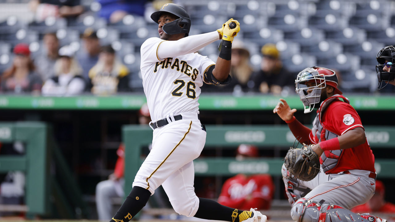 PITTSBURGH, PA - SEPTEMBER 28: Pittsburgh Pirates left fielder Miguel Andujar (26) doubles to center field to drive in a run in the first inning of an MLB game against the Cincinnati Reds on September 28, 2022 at PNC Park in Pittsburgh, Pennsylvania.