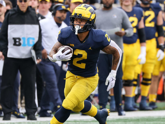 Michigan s Corum in action vs. Ohio State theScore