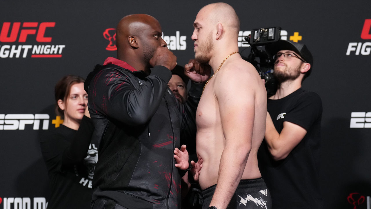 LAS VEGAS, NEVADA - NOVEMBER 18: (L-R) Opponents Derrick Lewis and Serghei Spivac of Moldova face off during the UFC Fight Night weigh-in at UFC APEX on November 18, 2022 in Las Vegas, Nevada.